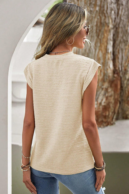 Beige effen T-shirt met vleermuismouwen en ronde hals