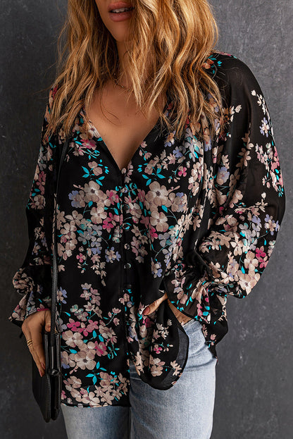 Zwarte chiffon blouse met wilde bloemenprint