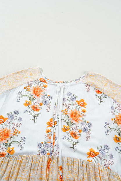 Witte plus-size blouse met bloemenprint, V-hals en pofmouwen