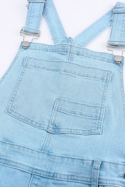 Hemelsblauw geconstrueerde noodlijdende denim overall met borstzak