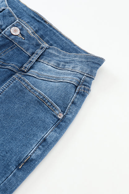 Blauwe zakflare-jeans met hoge taille en stiksels