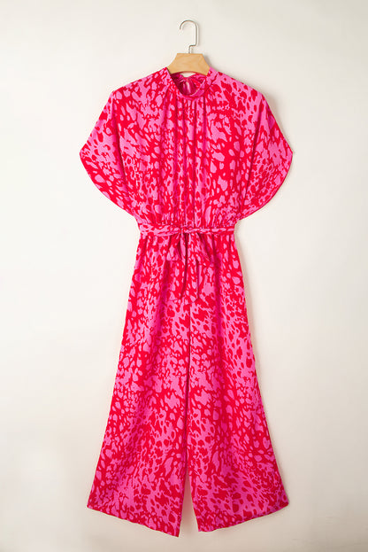 Roze luipaard jumpsuit met wijde pijpen, losse mouwen en riem