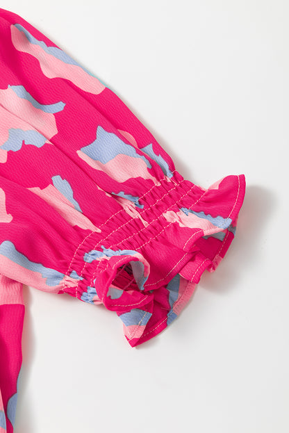 Roze gelaagde losse jurk met pofmouwen en korte mouwen met abstracte print