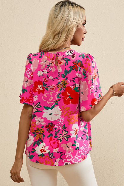 Roze gebloemde gesmokte blouse met korte mouwen