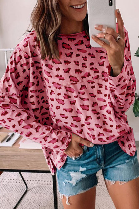 Roze top met lange mouwen en stiksels met dierenprint