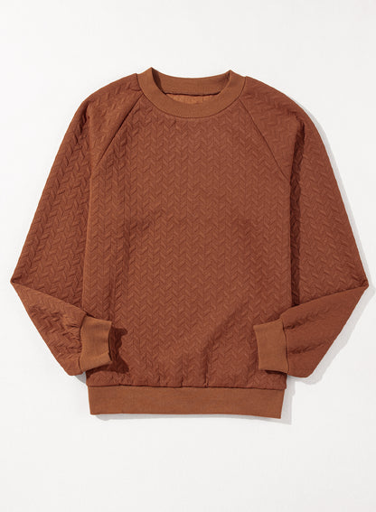 Kastanjekleurig sweatshirt met effen textuur en raglanmouwen