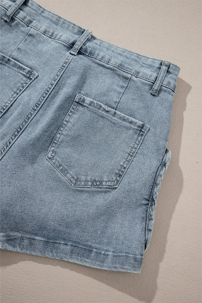 Schemerblauwe jeansshort met studs in zure wassing