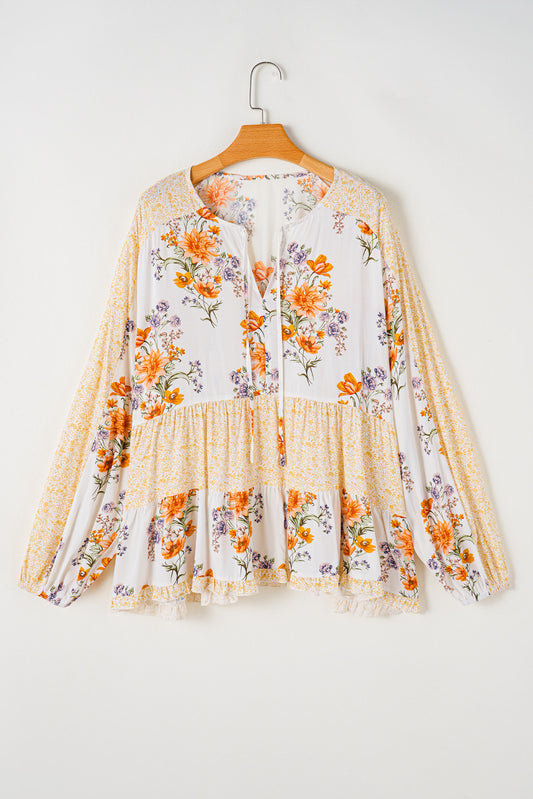 Witte plus-size blouse met bloemenprint, V-hals en pofmouwen