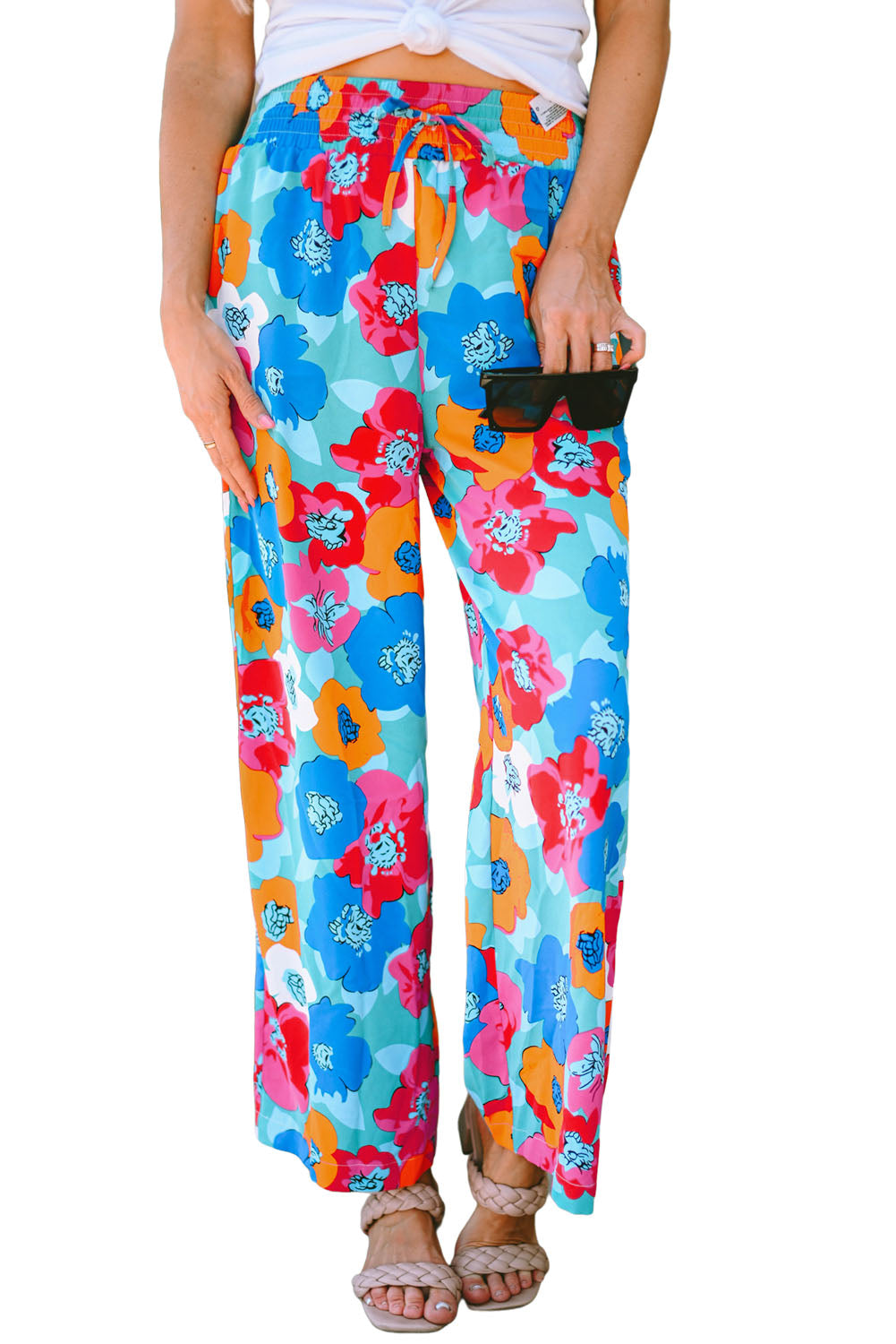 Broek met veelkleurige abstracte bloemenprint en trekkoord met brede tailleband