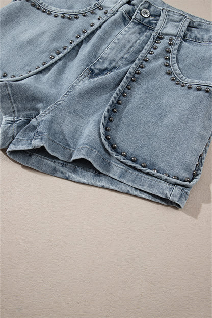 Schemerblauwe jeansshort met studs in zure wassing