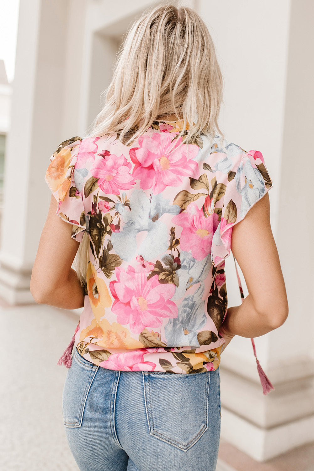 Roze bloemenprint blouse met kwastje en korte mouwen