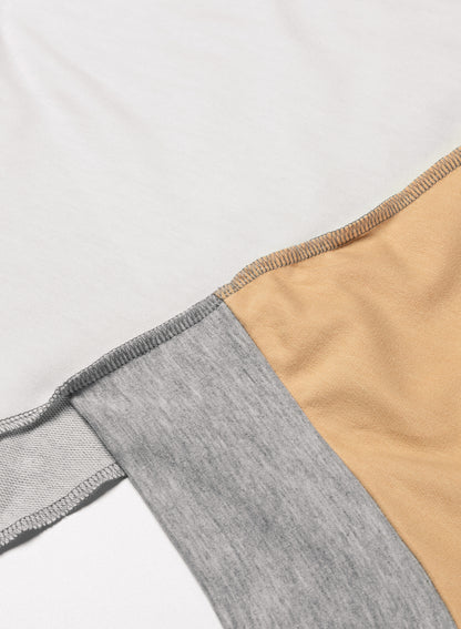 Licht Frans beige colorblock stiksel, onregelmatige zoom, top met lange mouwen