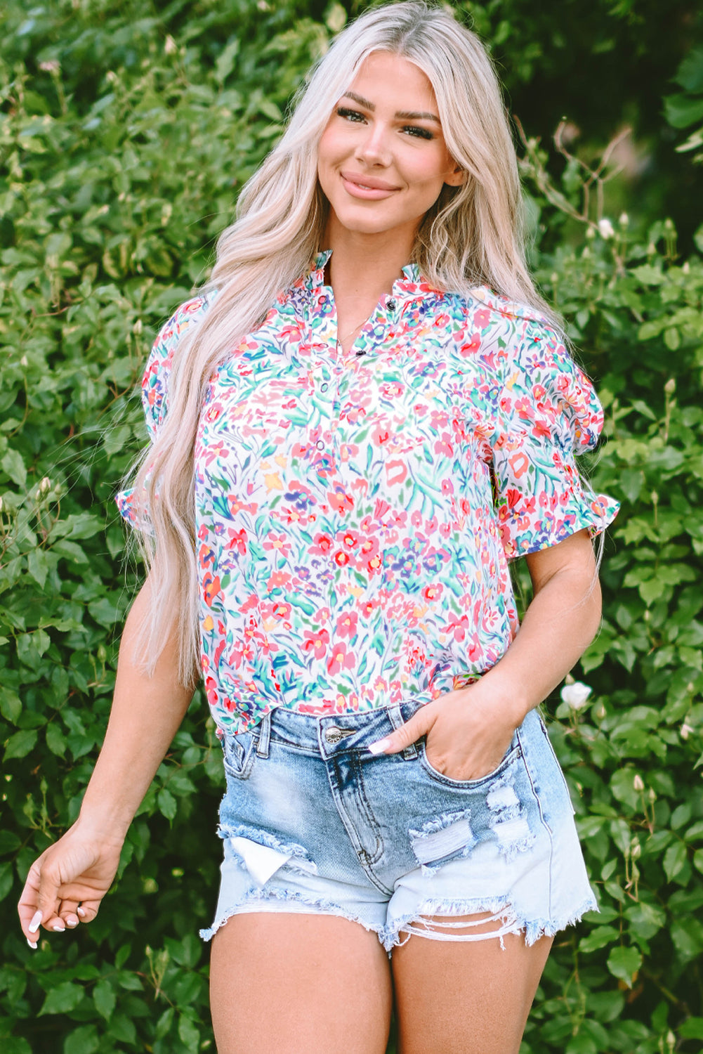 Roze bloemenprint blouse met splithals en pofmouwen