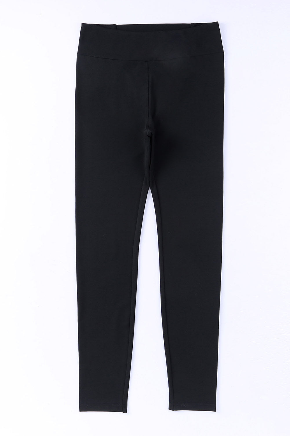 Zwarte legging met gekruiste buikcontrole en hoge taille