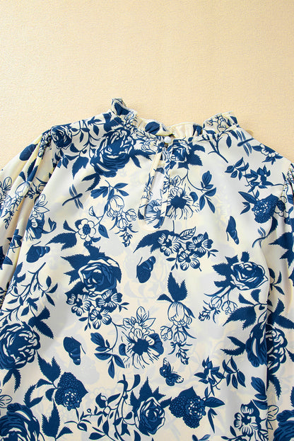 Blouse met bloemenprint, volantmouwen en sleutelgatrug in hemelsblauw