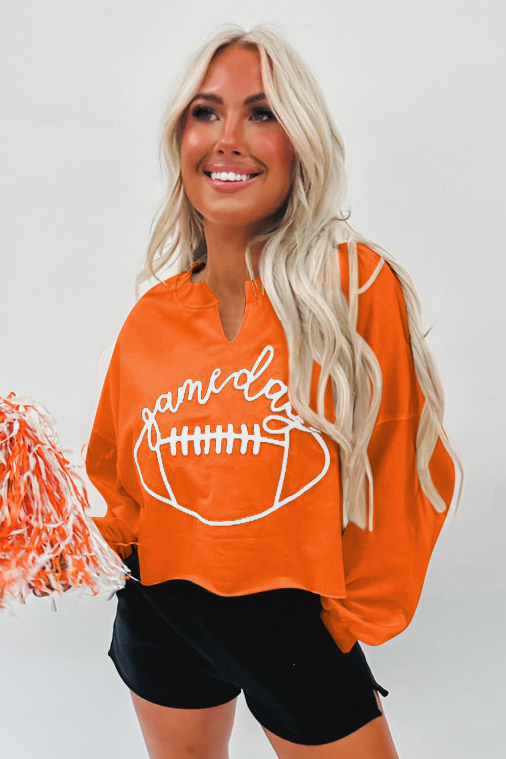 Oranje Game Day-sweatshirt met rugbyvoetbal en ingekerfde hals