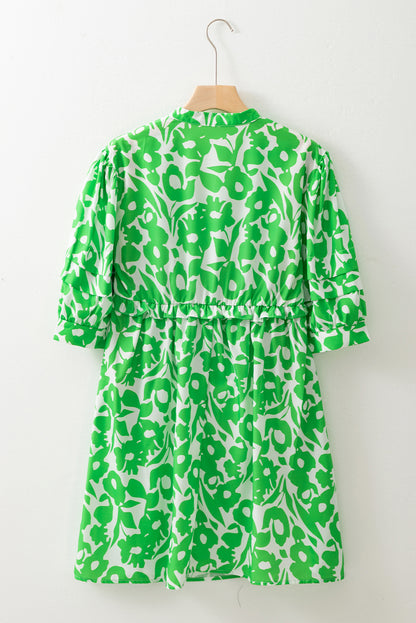 Groene bloemenprint Buff halve mouw v nek babydoll jurk