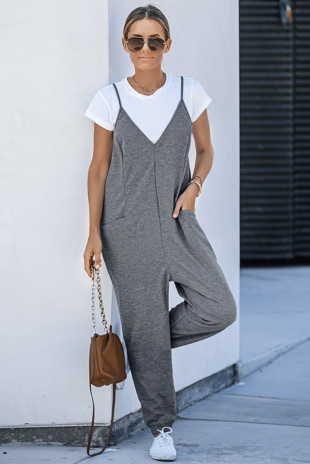 Grijze getextureerde mouwloze casual jumpsuit met V-hals en zakken