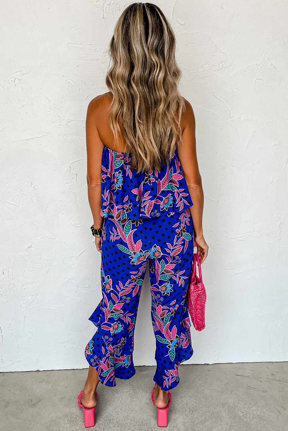 Blauwmix strapless jumpsuit met ruches en tropische print