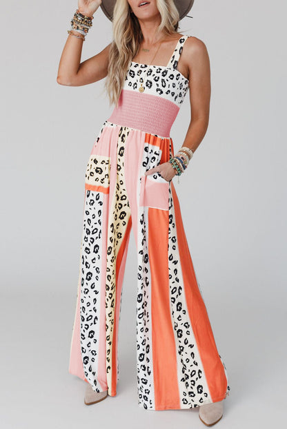 Roze jumpsuit met zakken en print in luipaardkleurenblokken