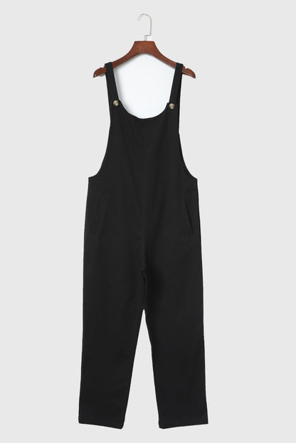 Zwarte cropped jumpsuit met knoopriemen en zakken