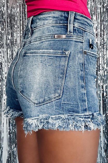 Blauwe skinny denim shorts met ruwe zoom en hoge taille