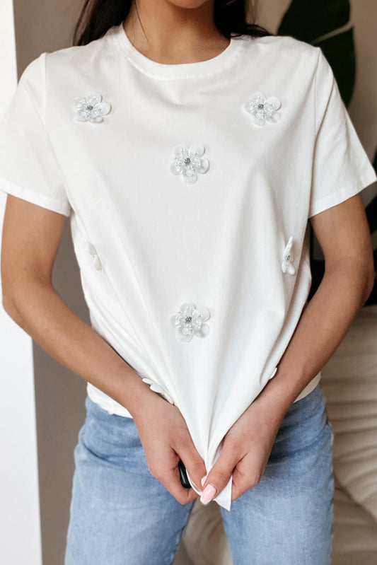 T-shirt met ronde hals en witte bloemenapplicatie