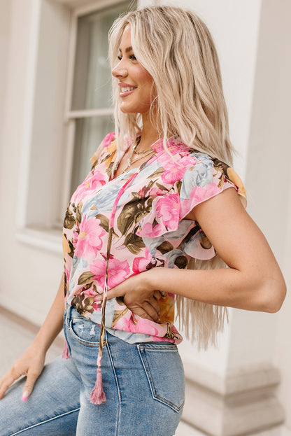 Roze bloemenprint blouse met kwastje en korte mouwen