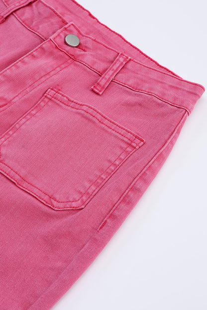 Roze enkellange jeans met uitlopende pijpen en ruwe zoom