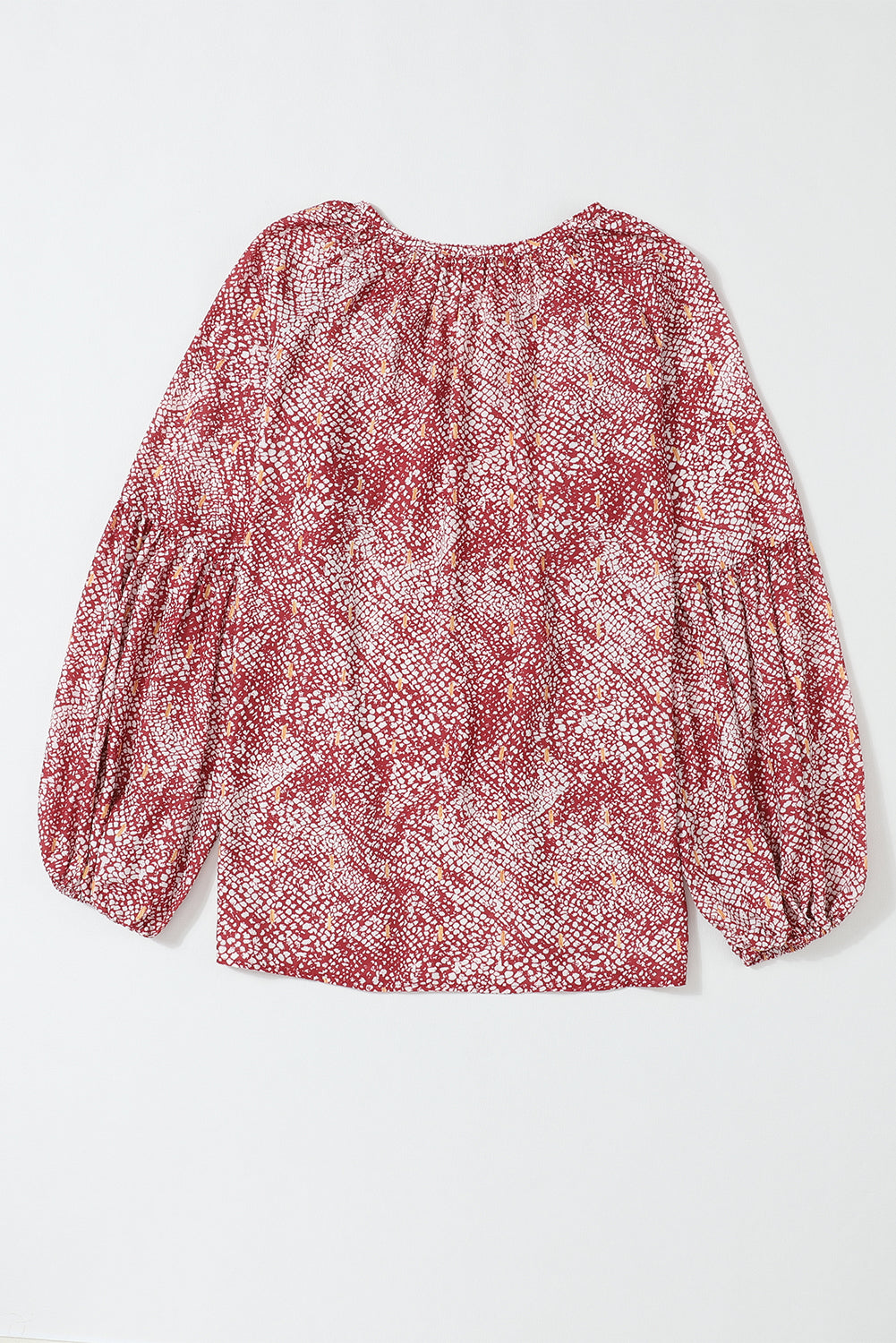 Vurige rode geplooide blouse met abstracte print en lantaarnmouwen