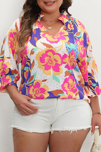 Rozerode bloemenprint, splithals, korte pofmouwen en blouse