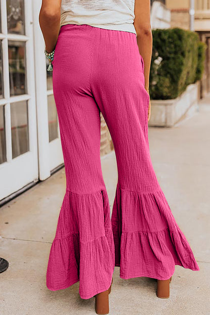 Roze getextureerde Bell Bottom-broek met hoge taille en ruches