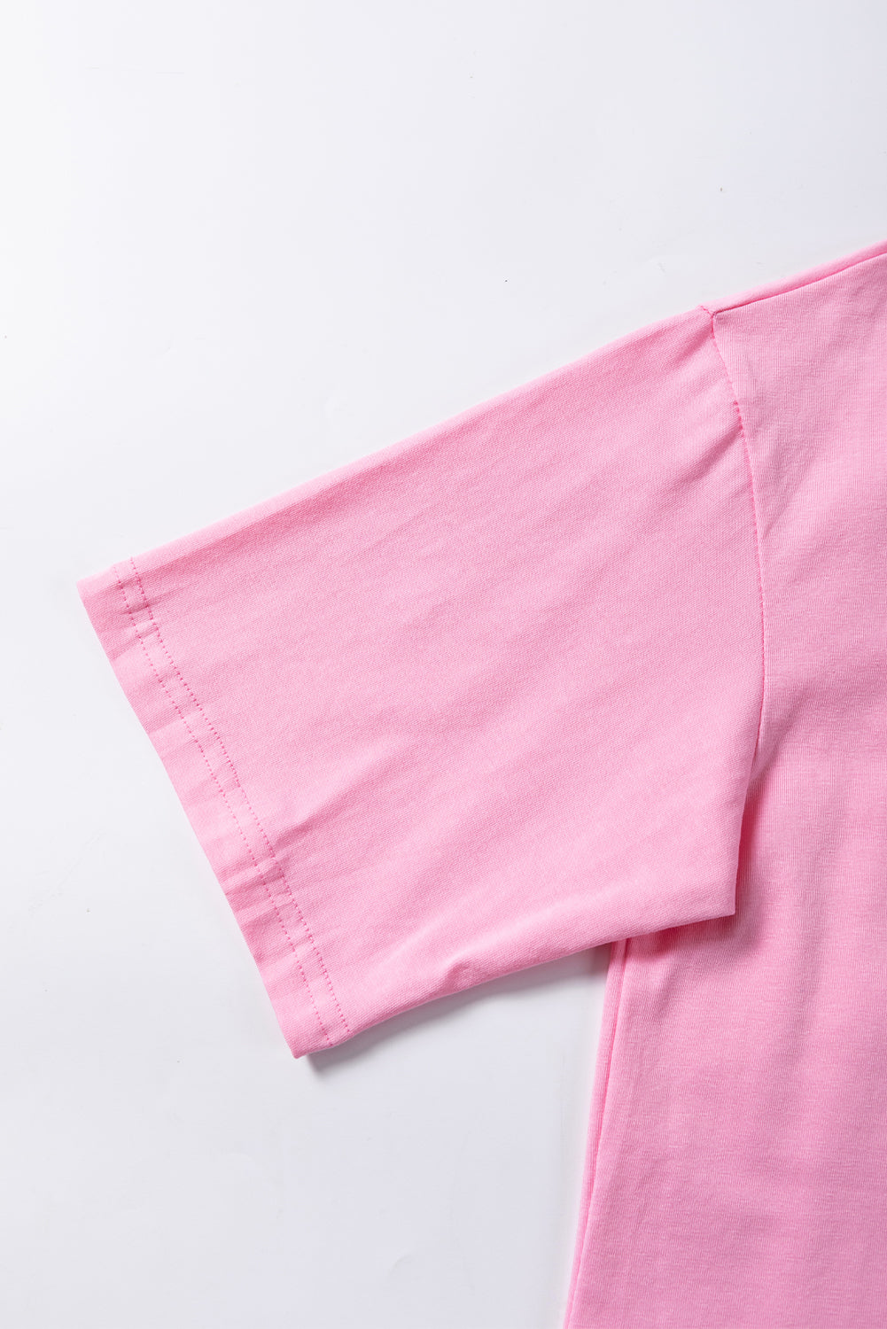 Roze cropped T-shirt met pailletten en franjes