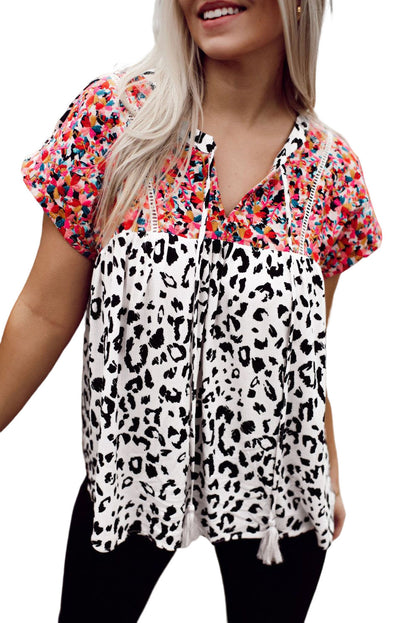 Blouse met luipaardmix en kwastjes