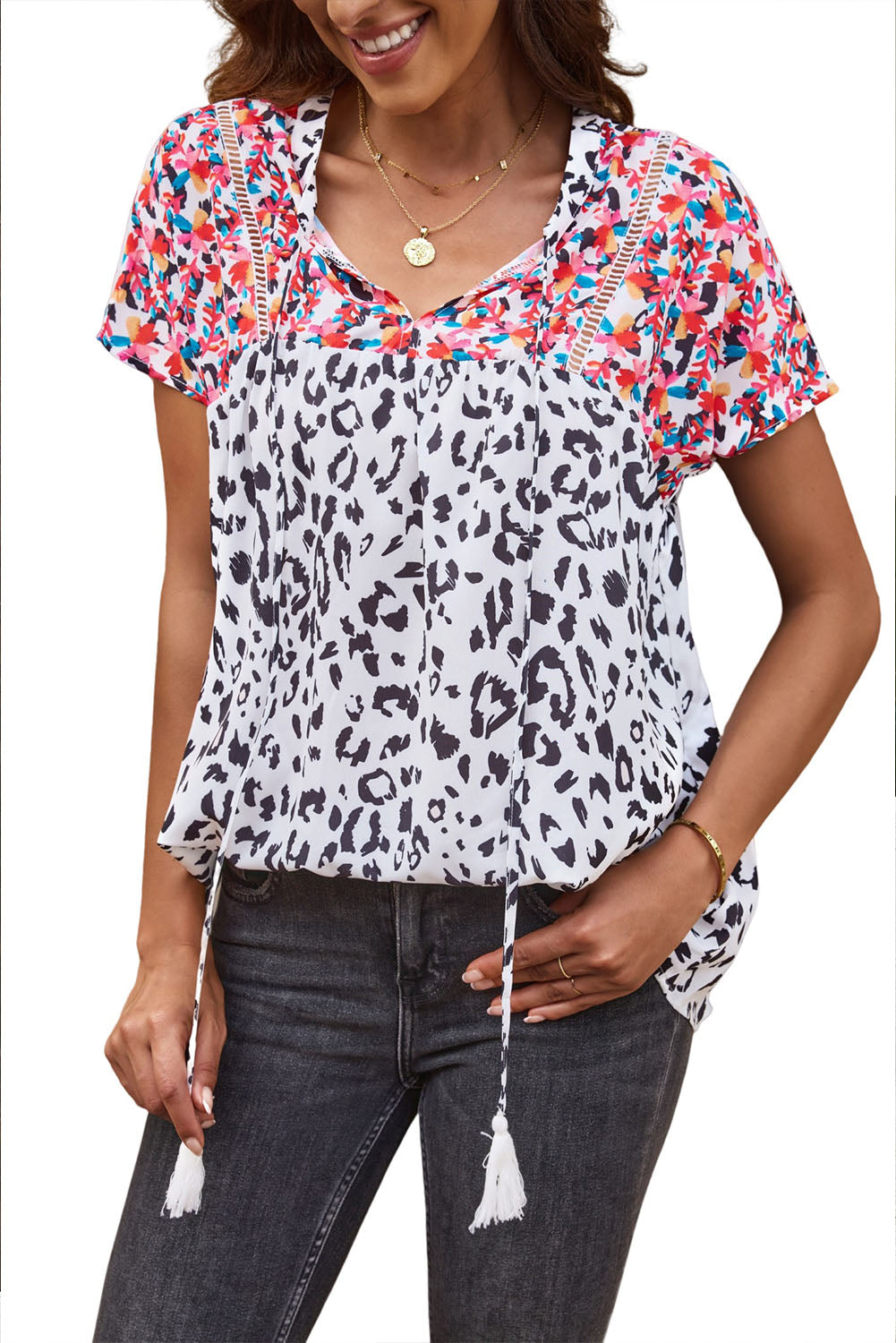 Blouse met luipaardmix en kwastjes