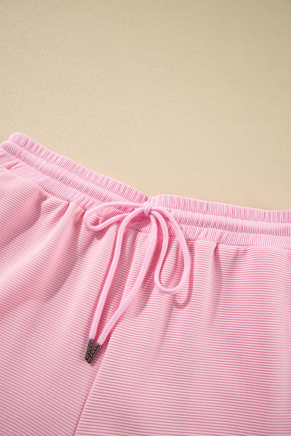 Roze textuur gegolfde mouw ritssluiting en brede pootbroek set