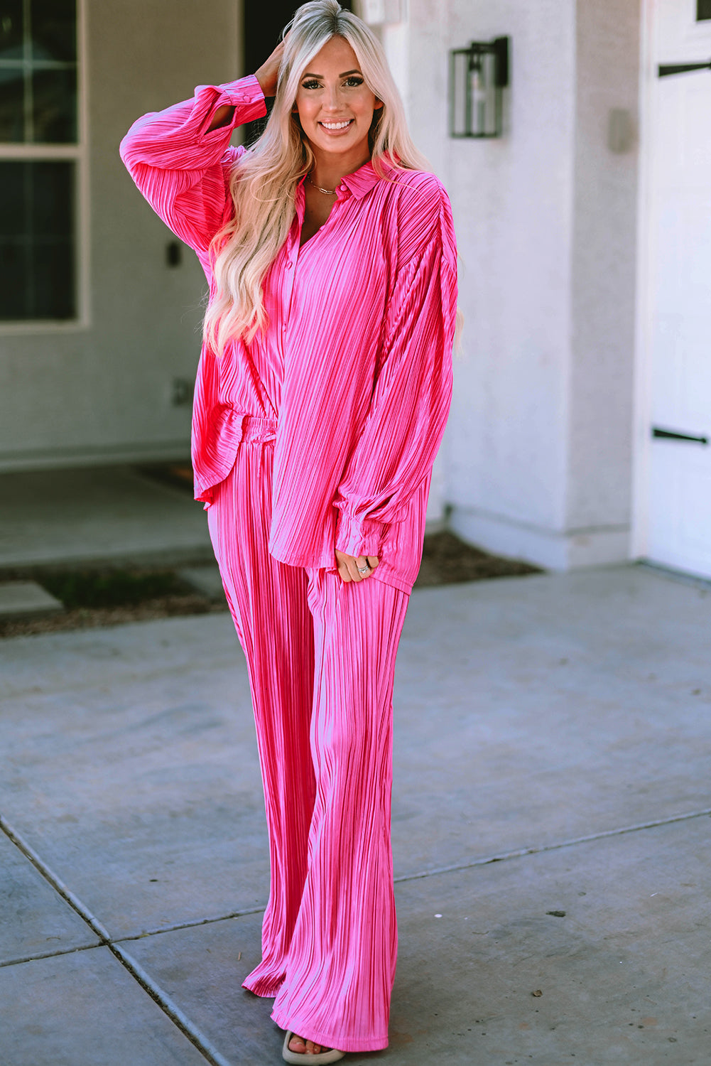 Set van geplooid shirt met lange mouwen en wijde broek met roze pijpen