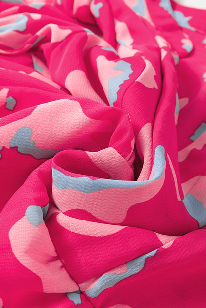 Roze gelaagde losse jurk met pofmouwen en korte mouwen met abstracte print