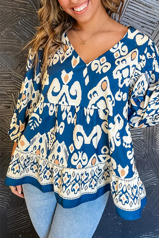 Blauwe tribale geometrische print 3/4 mouwstroom fit blouse