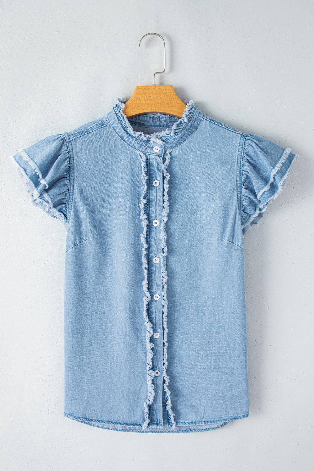 Beau blauwe gegolfde denim top met knopen aan de voorkant