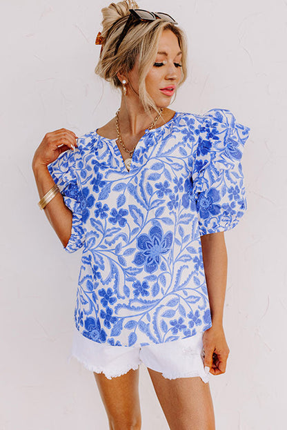 Donkerblauwe blouse met bloemenprint en ruches met bubbelmouwen