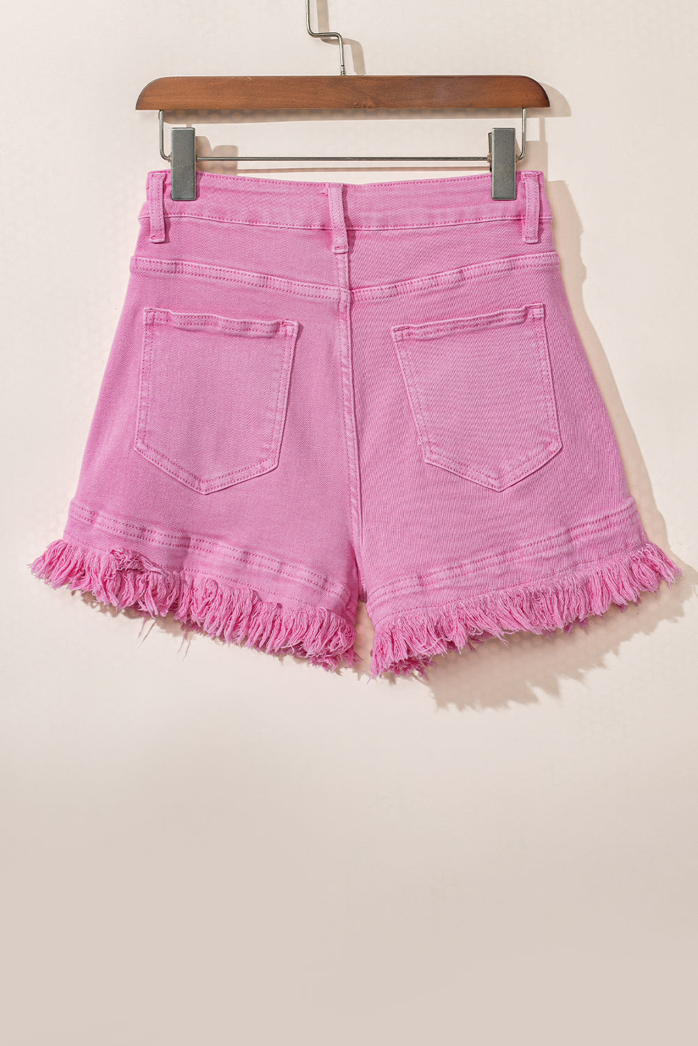 Roze gerafelde rand mid-rise denim shorts