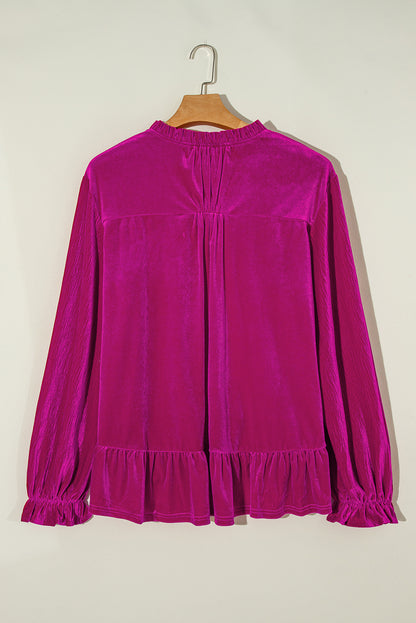 Felroze fluwelen blouse met V-hals en geplooide mouwen in grote maten