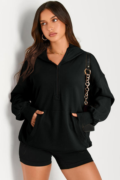 Zwarte massieve kangoeroe -zak half ritssluiting oversized hoodie