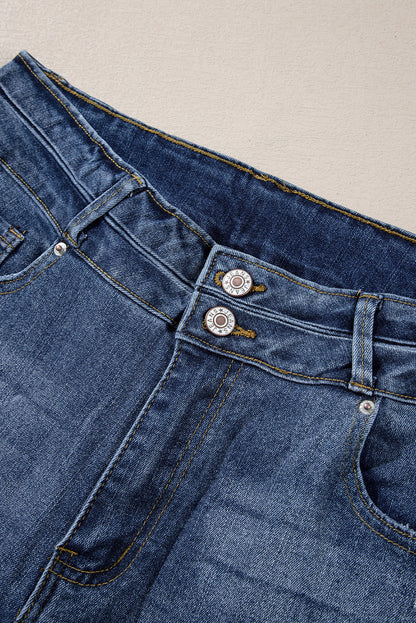 Hemelsblauwe flare-jeans met hoge taille, gescheurde knoopsluiting