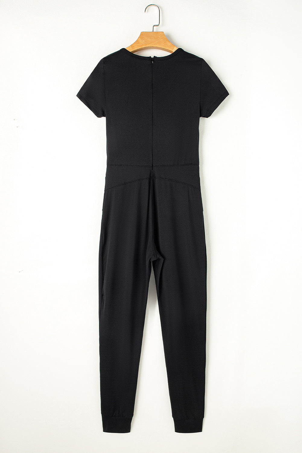 Zwarte Athleisure jumpsuit met korte mouwen en pocketjogger aan de onderkant