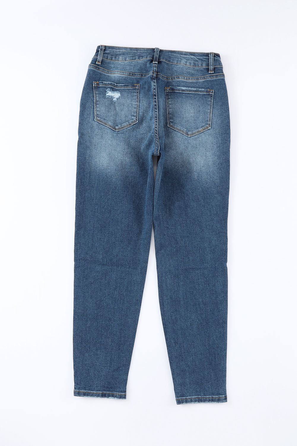 Blauwe noodlijdende skinny jeans met hoge taille en knoopsluiting