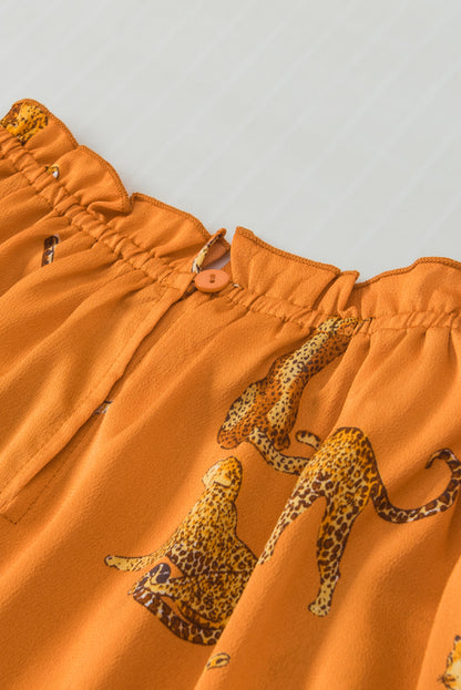 Oranje blouse met cheetah-print en gegolfde mouwen