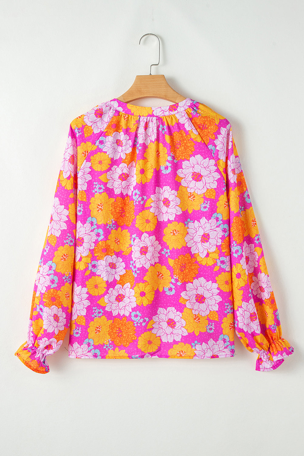 Blouse met rozenprint, geplooide mouwen en een inkeping in de hals