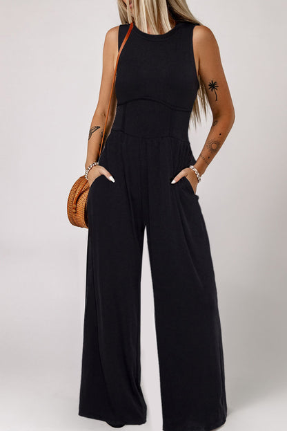 Zwarte mouwloze jumpsuit met wijde pijpen en geplooide taille